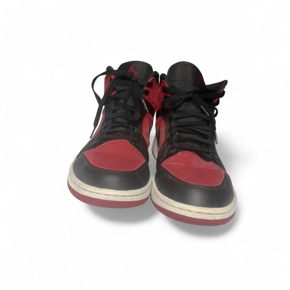 Rare Iconic Air Jordan 1 Mid "Reverse Banned" sneakers